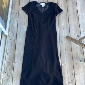 Evan-picone dress.  Black with ornate beads in front. Great dress for a wedding